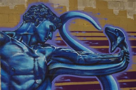 man holding a snake graffiti art free image | Peakpx