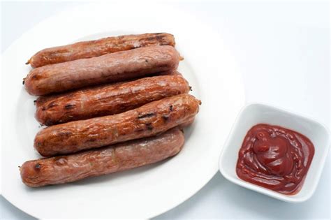 Sausages and ketchup - Free Stock Image