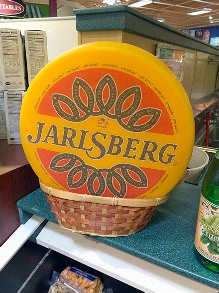 Faux Jarlsberg Cheese Wheel in Wicker – Fixtures Close Up