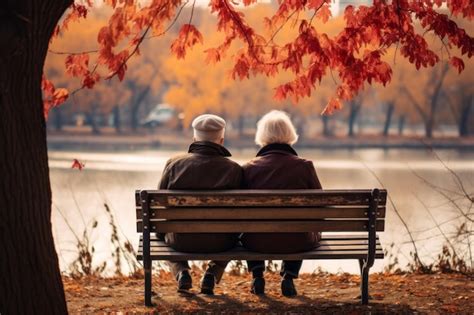 Premium AI Image | elderly couple on a bench in autumn park