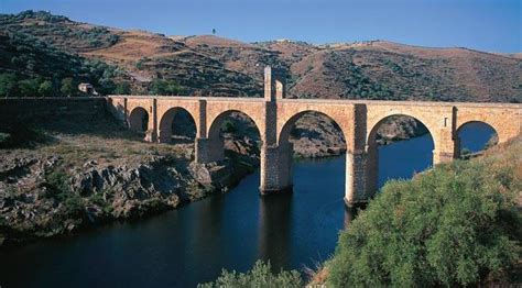 Alcántara Bridge: monuments in Alcántara, Cáceres at Spain is culture.