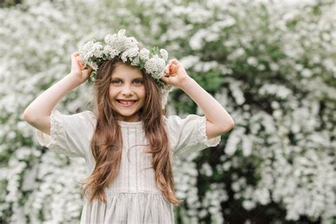 Laughing Girl With Flowers Wreath - Stock Photos | Motion Array