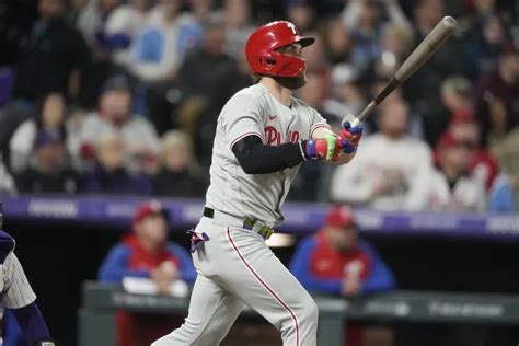 An eighth-inning surge from the Phillies fuels a road win against the Rockies