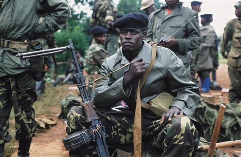 Soldiers of the Rwandan Patriotic Front prepare for the March on Kigali, 1994. [1600x1048] : r ...