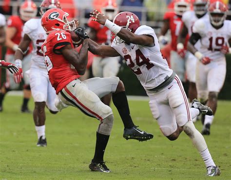 PHOTOS: Rough day for UGA in the rain against Alabama