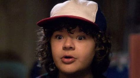 The hat blue white red Dustin Henderson (Gaten Matarazzo) in Stranger Things S01E01 | Spotern