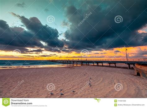 Glenelg Beach Jetty at Sunset Stock Photo - Image of coast, scenic ...