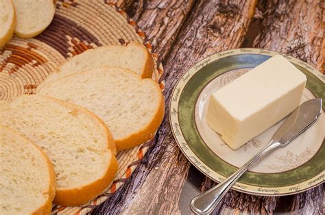 Fresh Bread and Butter Photograph by Jon Manjeot | Fine Art America