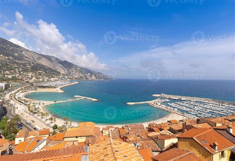 Scenic panoramic view of Menton seashore promenade and historic city in ...