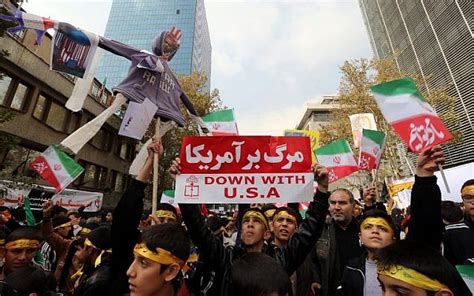 Thousands of flag-burning Iranians mark US embassy seizure | The Times ...