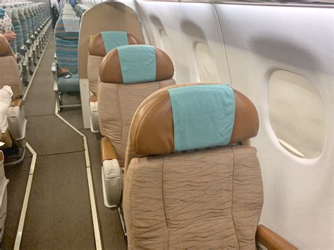 Review - Oman Air Embraer 175 Business Class, Muscat - Dubai - Points ...