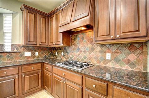 Baltic Brown granite with matching backsplash. | Baltic brown granite, Brown granite, Kitchen