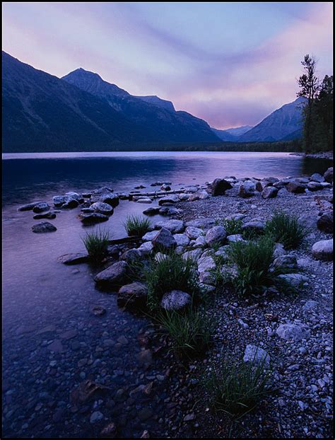 Picture: Lake McDonald at sunset with forest fire smoke, Glacier National Park, Montana