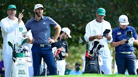 Dustin Johnson with caddie Austin Johnson and Sungjae Im with caddie Robert Gregory Brown wait ...