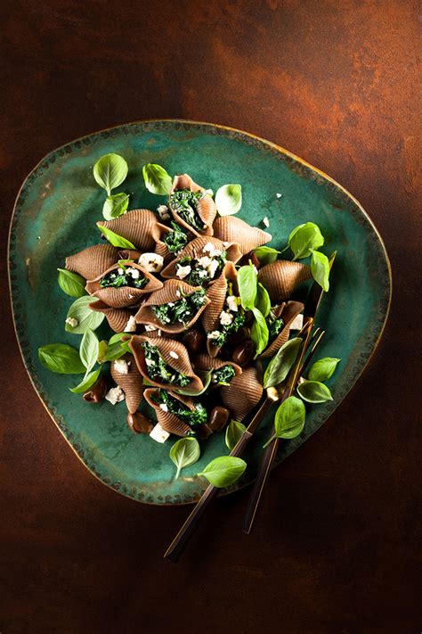 pasta shells with spinach, garlic and feta cheese on Behance