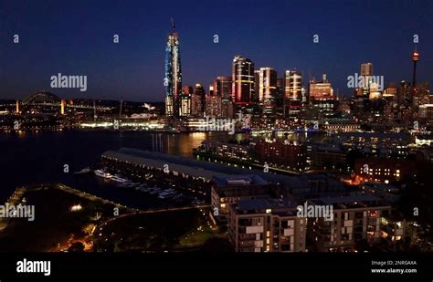 Sydney skyline illuminated at night Stock Photo - Alamy