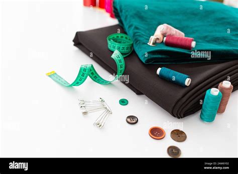 Sewing background. Set of tailoring tools on white background Stock Photo - Alamy