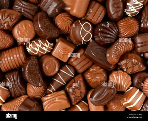 assorted chocolates background Stock Photo: 9781571 - Alamy