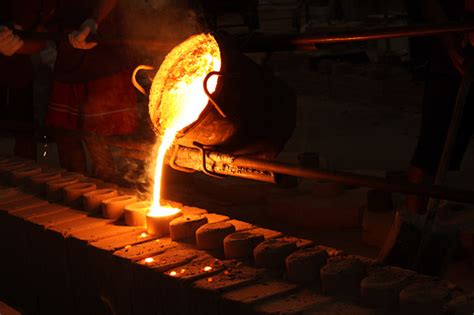 A Melted Iron Ore Being Casted To A Round Mold Stock Photo - Download Image Now - iStock