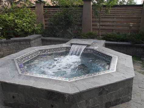 Classic Hanover stainless steel hot tub with custom tile and waterfall. | Hot tub, Jacuzzi ...