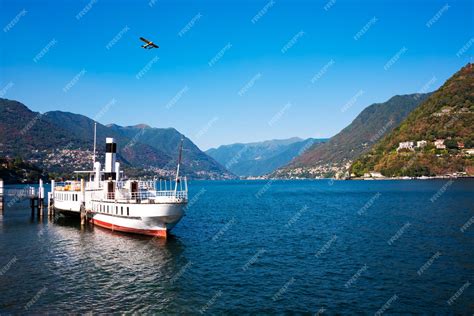 Premium Photo | Beautiful landscape of lake como with a boat