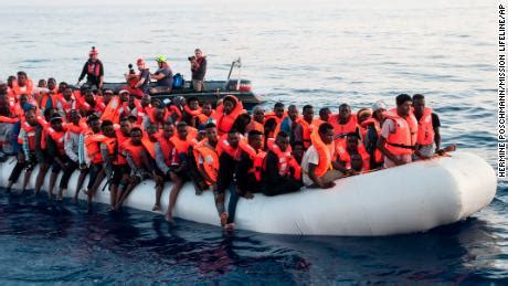 Almost 350 migrants are stranded on two boats in the Mediterranean - CNN