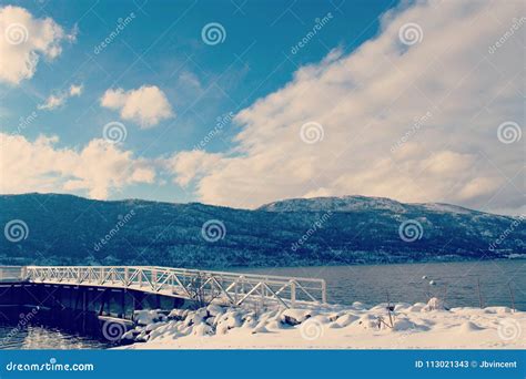 Lake Dock in Winter with Snow Covered Mountains Stock Image - Image of tourism, mountain: 113021343