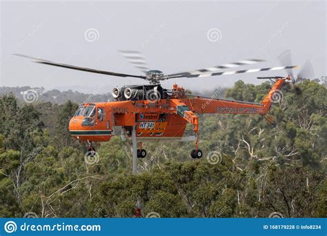 Erickson Air Crane Helicopter Taking Off after Filling with a Load of ...