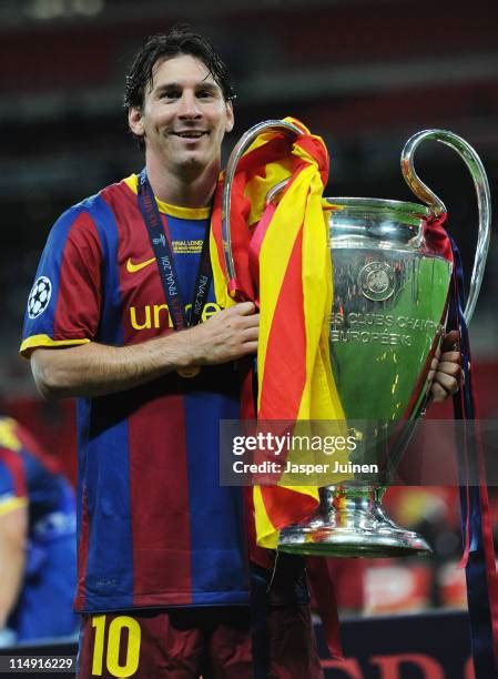 Messi And Champions League Trophy Photos and Premium High Res Pictures ...