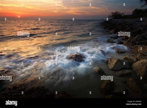 Sunset at Port Dickson beach in Negeri Sembilan, Malaysia Stock Photo - Alamy