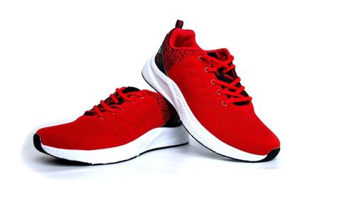 Premium Photo | Red sneakers isolated on white