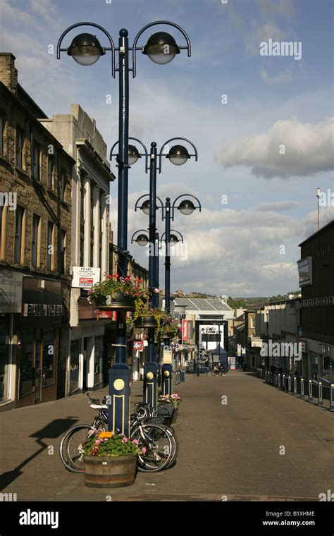 Town of Huddersfield, England. Evening view of Huddersfield’s King Street with the Kingsgate ...