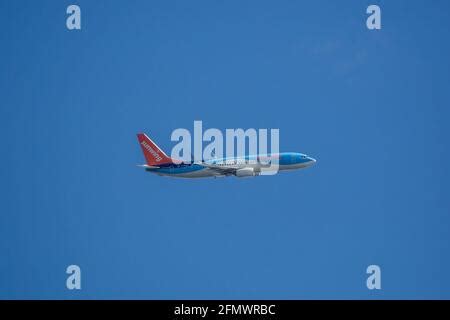 Sunwing Airlines plane airplane Boeing 737 (737-800) narrow-body jet airliner airborne after ...