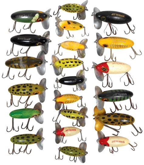 several different types of fishing lures hanging from hooks