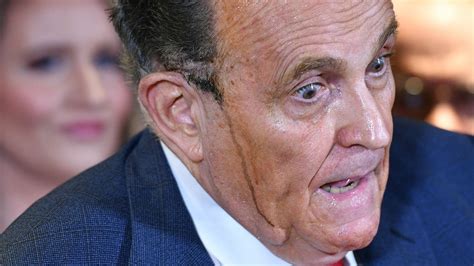 Rudy Giuliani: Hair dye streams down sweating Trump lawyer's face in ...