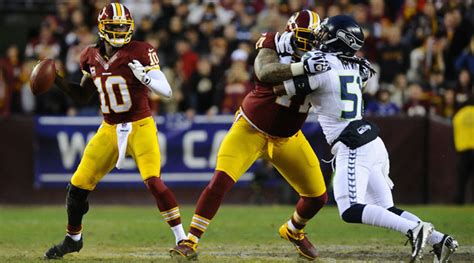 Robert Griffin III dealing with knee injury early against Seahawks - CBSSports.com