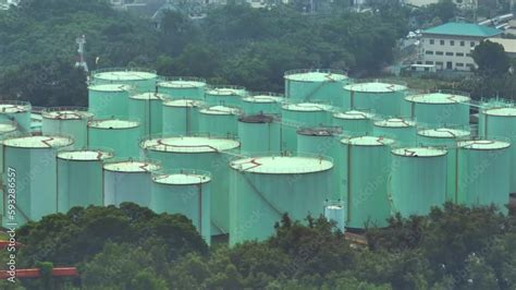 From an aerial view, an oil depot usually appears as a large industrial ...