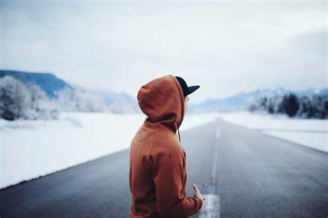 Man Walking on Road Under the Sun · Free Stock Photo