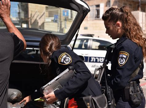 Israel Policewomen Checking Car - Police Chief Magazine