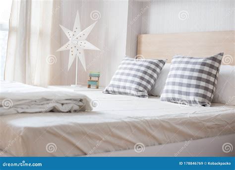 Luxury Pillows on White Bed in Bedroom Stock Image - Image of comfortable, apartment: 178846769