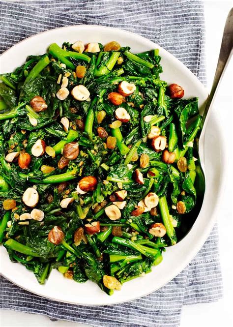 Rapini (Broccoli Rabe) with Raisins and Hazelnuts - Pinch and Swirl