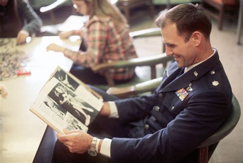 A returnee from a Vietnamese prisoner of war camp catches up on events ...