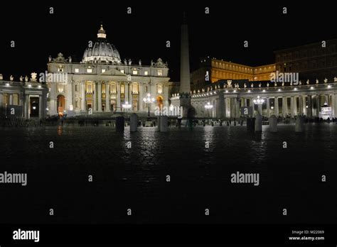 Saint Peter square and Basilica at night with some movement in the ...