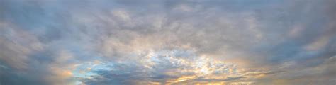 Panorama of clouds in the sky at golden hour 1916826 Stock Photo at ...