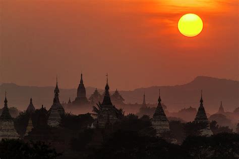 Myanmar Sunset Over Bagan Temples In by Alantobey