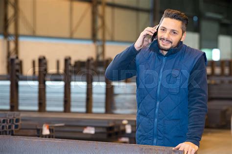 factory worker using telephone | Stock image | Colourbox