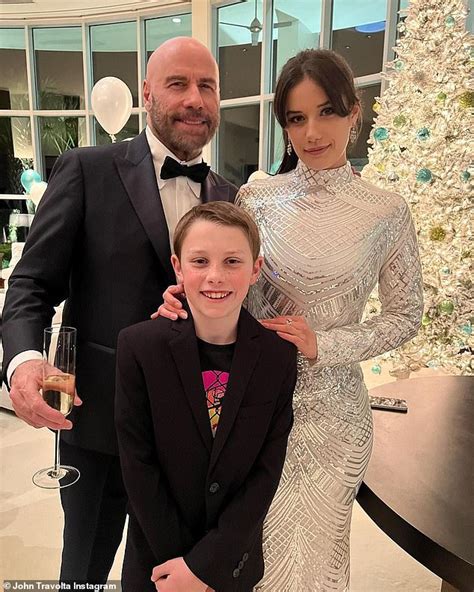 John Travolta proudly poses alongside his glamorous daughter Ella, 21, and son Benjamin, 11 ...