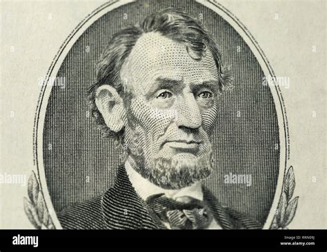 Abraham Lincoln portrait on a five dollar bill Stock Photo - Alamy