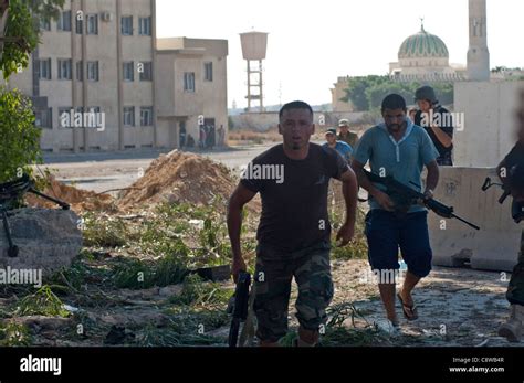 The storming of Gaddafi palace at Baba Al Azia Stock Photo - Alamy