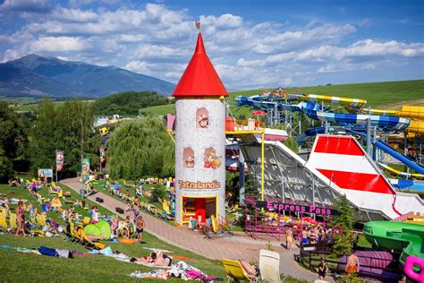 Colorful water slides in aquapark Tatralandia in town Liptovsky Mikulas ...